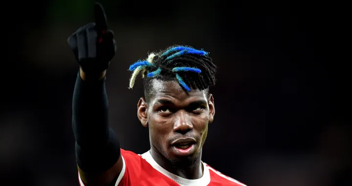 epa09535109 Manchester United's Paul Pogba reacts after winning the UEFA Champions League group F soccer match between Manchester United and Atalanta BC in Manchester, Britain, 20 October 2021. EPA/Peter Powell