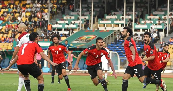 epa09718512 Egypt captain Mohamed Salah (C-R) celebrates scoring the equalizer during the 2021 Africa Cup of Nations AFCON quaterfinal soccer match between Egypt and Morocco held at Ahmadou Ahidjo Stadium in Yaounde, Cameroon, 30 January 2022. EPA/Shaun Roy This image is intended for Editorial use (e.g. news articles). Any commercial use (e.g. ad campaigns) requires additional clearance. Contact: photo@backpagemedia.co.za for more information EDITORIAL USE ONLY