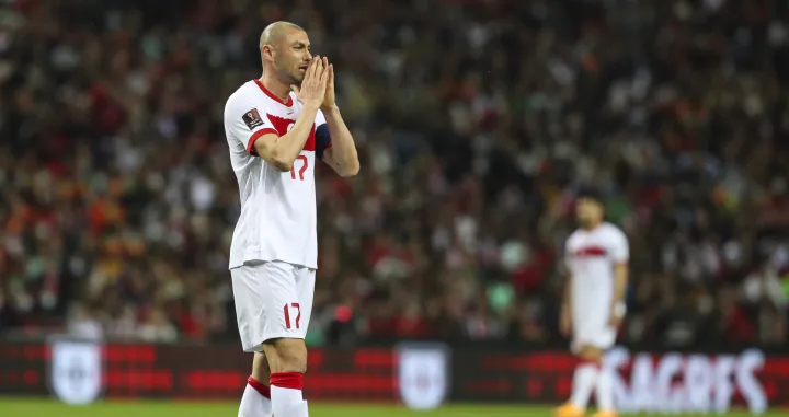 epa09847519 Turkey's Burak Yilmaz reacts during the FIFA World Cup Qatar 2022 play-off qualifying soccer match between Portugal and Turkey held on Dragao stadium in Porto, Portugal, 24 March 2022. EPA/JOSE COELHO