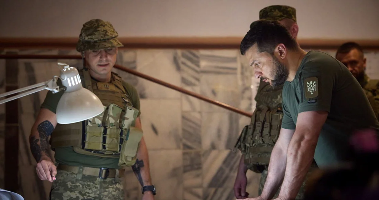 epa10059230 A handout photo made available by via the official Telegram channel of the President of Ukraine on 08 July 2022 shows Ukrainian President Volodymyr Zelensky (R) during a visit to advanced positions in the Dnipropetrovsk region, Ukraine. Zelensky held a meeting on the situation in the region and the state of affairs in military units, he said in a post on his channel. EPA/TELEGRAM/V_Zelenskiy_official/HANDOUT HANDOUT EDITORIAL USE ONLY/NO SALES/Telegram/v_zelenskiy_official/Handout