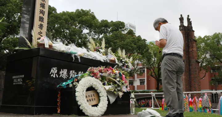 epa08592820 An atomic-bomb survivor offers a prayer for victims killed by the 1945 atomic bombing in front of the Hypocenter Cenotaph at Nagasaki Peace Park in Nagasaki, southwestern Japan, 09 August 2020, marking the 75th anniversary of the atomic bombing in 1945. It is said about 74,000 residents were killed by the atomic bombing. An atomic bomb exploded on 09 August 1945 in the sky about 500 meters above the point where this monument stands. By the end of December, some 74,000 people had died and some 75,000 suffered from various injuries, according to Nagasaki City officials. EPA/JIJI JAPAN OUT EDITORIAL USE ONLY/ NO ARCHIVES/Jiji