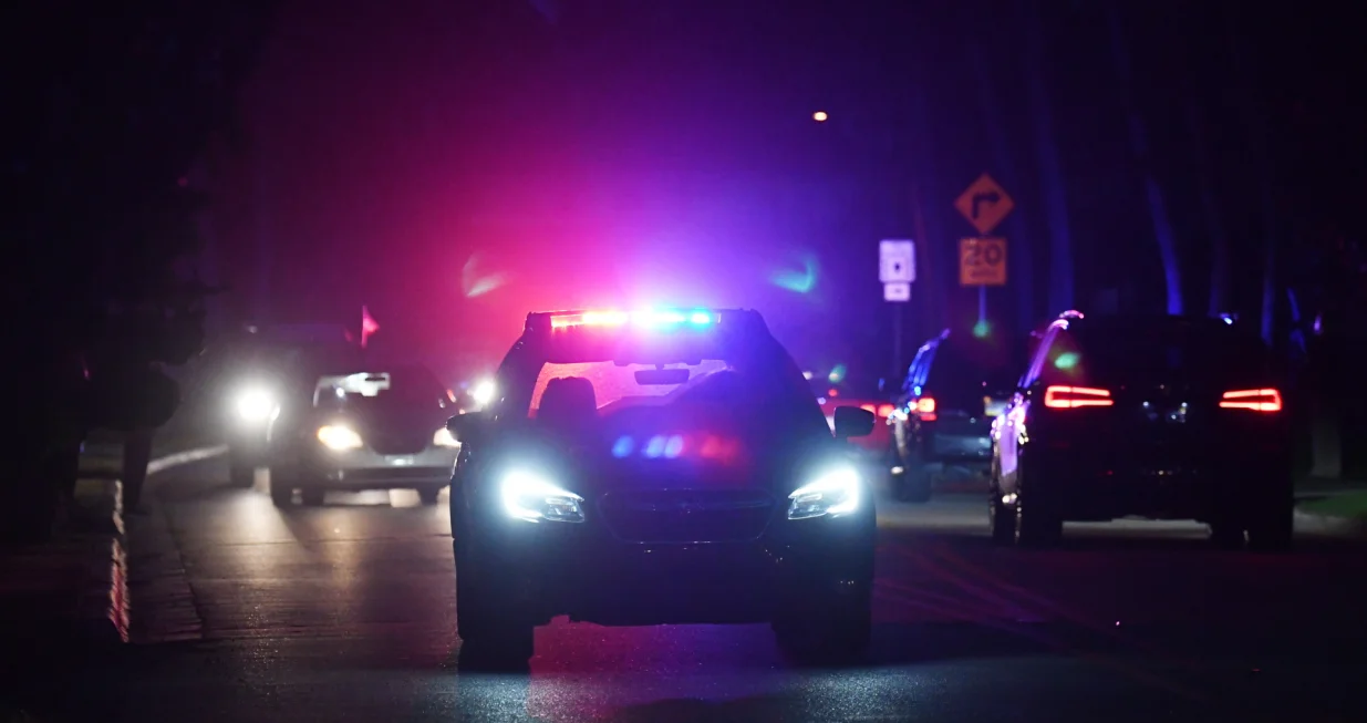 epa10112022 Authorities stand outside Mar-a-Lago, the residence of former president Donald Trump, amid reports of the FBI executing a search warrant as a part of a document investigation, in Palm Beach, Florida, USA, 08 August 2022. EPA/JIM RASSOL/Jim Rassol