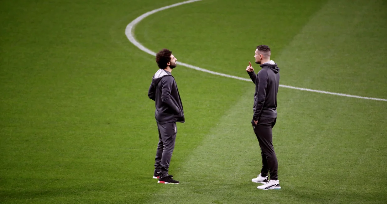 epa08224407 Liverpool's striker Mohamed Salah (L) and defender Dejan Lovren inspect the pitch at Wanda Metropolitano stadium in Madrid, Spain, 17 February 2020. Liverpool FC will face Atletico Madrid in their UEFA Champions League Round of 16 first leg match on 18 February 2020. EPA/JUANJO MARTIN