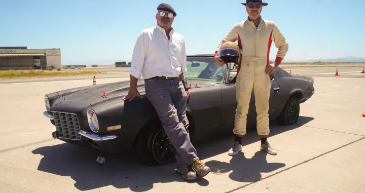 Hosts Adam Savage & Jamie Hyneman pose with test car at Alameda Runway./