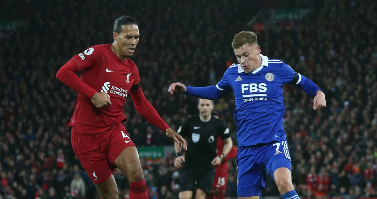 epa10383084 Virgil Van Dijk (L) of Liverpool in action against Harvey Barnes of Leicester during the English Premier League soccer match between Liverpool FC and Leicester City in Liverpool, Britain, 30 December 2022. EPA/Adam Vaughan EDITORIAL USE ONLY. No use with unauthorized audio, video, data, fixture lists, club/league logos or 'live' services. Online in-match use limited to 120 images, no video emulation. No use in betting, games or single club/league/player publications
