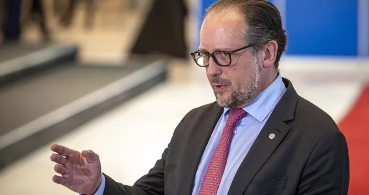epa10147434 Austria's Foreign Minister Alexander Schallenberg talks to media as he arrives for the European Foreign Ministerial Meeting in Prague, Czech Republic, 30 August 2022. EPA/MARTIN DIVISEK/Martin Divisek