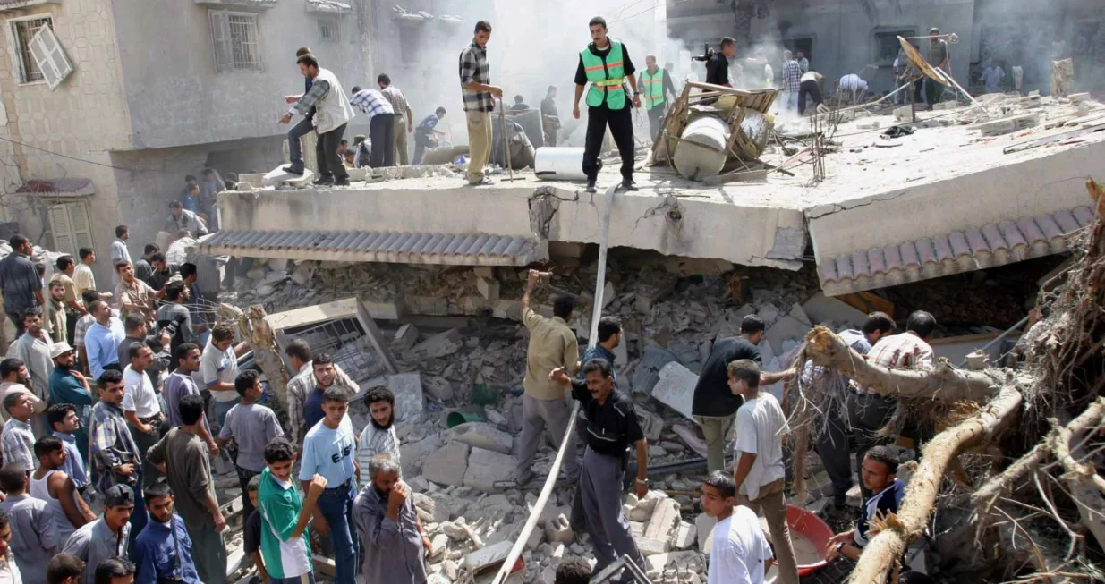 epa08698256 (FILE) - Palestinians search in the rubble of Hamas leader, Mahmoud al-Zahar's house, after an Israeli missile strike in Gaza strip September 10, 2003 (reissued 26 September 2020) The date 28 September 2020 marks an unofficial 20th anniversary of the violence that Palestinians called Intifada or Al-Aqsa Intifada and Israel a period of campaign of terrorism between Palestinians and Israel that started on 28 September 2000 and continued through the following years, after then Israeli opposition leader Ariel Sharon made a visit to the Temple Mount, a move that was seen by Palestinians as provocative. In addition, the situation was further aggravated by the 2000 Camp David Summit failure in July 2000 to find a conclusive peace process agreement for the Israeli-Palestinian conflict. The years until 2005 produced destruction and a large number of wounded and dead of many combatants and civilians on both sides. EPA/MOHAMMED SABER ATTENTION: This Image is part of a PHOTO SET *** Local Caption *** 00052076/Mohammed Saber