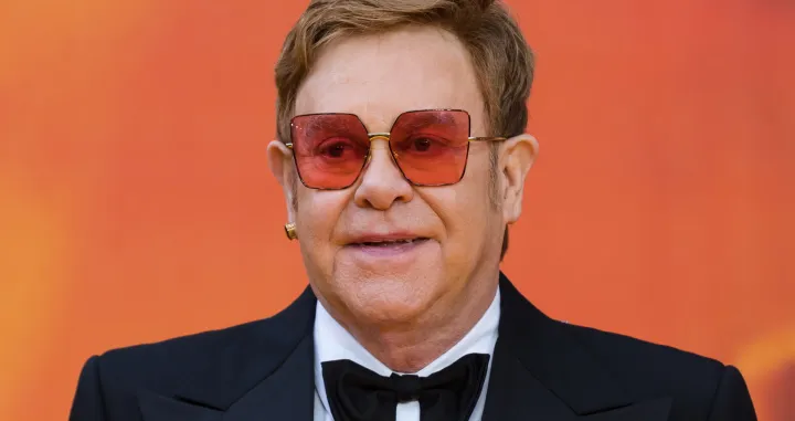 epa09842571 (FILE) - British musician Sir Elton John poses on the red carpet at the European premiere of 'The Lion King' in Leicester Square in London, Britain, 14 July 2019 (reissued 22 March 2022). Elton John turns 75 on 25 March 2022. EPA/VICKIE FLORES *** Local Caption *** 55731260/Vickie Flores