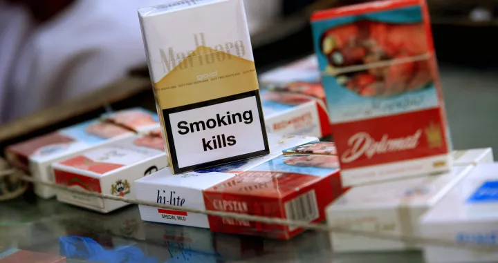 epa09985828 Cigarette packs are displayed for sale at a shop a day ahead of World No Tobacco Day, in Peshawar, Pakistan, 30 May 2022. The World No Tobacco Day will be observed on 31 May across the world to emphasize all the risks associated with tobacco and stand for effective policies to reduce its consumption. The theme of World No Tobacco Day 2022 is 'Protect the environment'. EPA/BILAWAL ARBAB/Bilawal Arbab