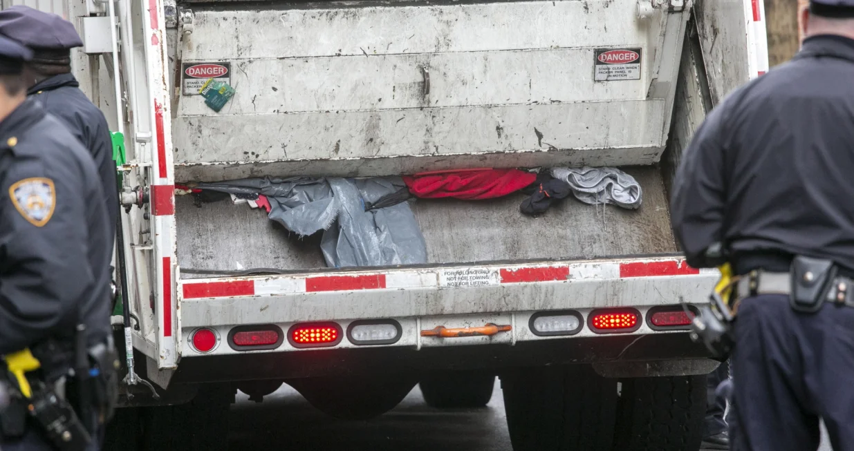 epa09874670 The final items of four tent encampment on 9th street off of Avenue B are processed by a garbage truck in New York, New York, USA, 06 April 2022. Activists and a homeless man were arrested for refusing to leave the encampment after police waited about seven hours before taking action. The people living in the encampment said they want housing, not shelter beds because they have not been safe at shelters in past experiences. EPA/SARAH YENESEL/Sarah Yenesel