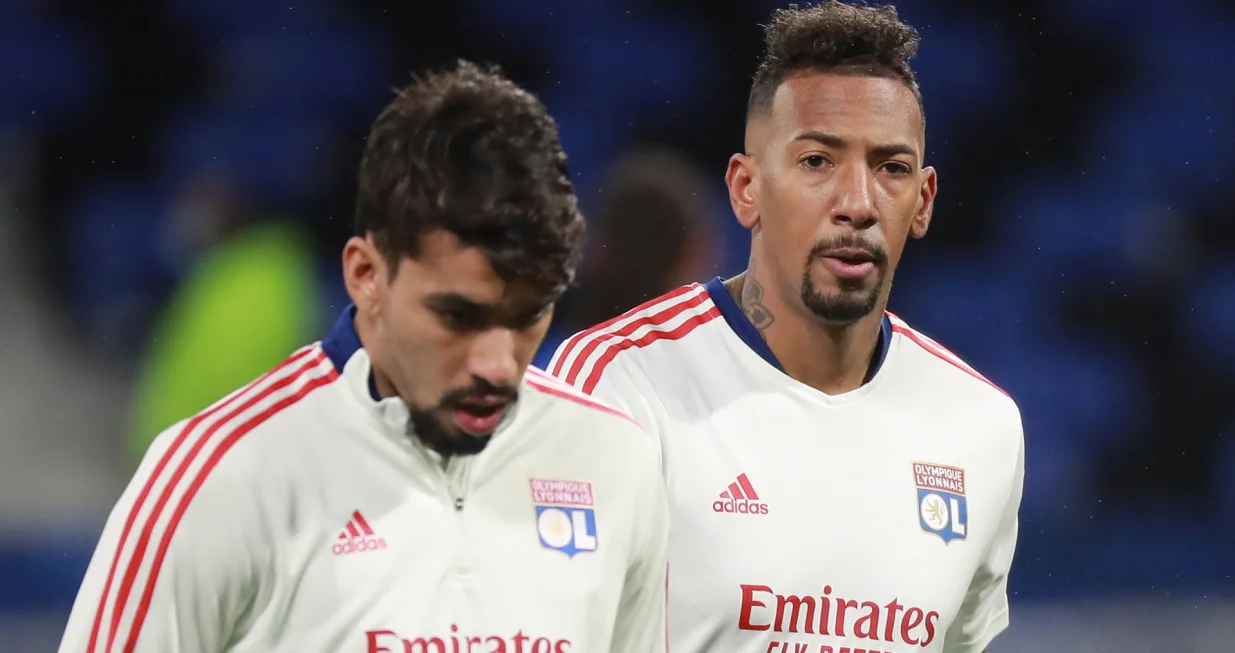 epa09676322 Lyon's Lucas Paqueta (L) and Lyon's Jerome Boateng (R) warm up before the French Ligue 1 soccer match between Olympique Lyonnais (OL) and Paris Saint-Germain (PSG) in Decines, near Lyon, France, 09 January 2022. EPA/CHRISTOPHE PETIT TESSON
