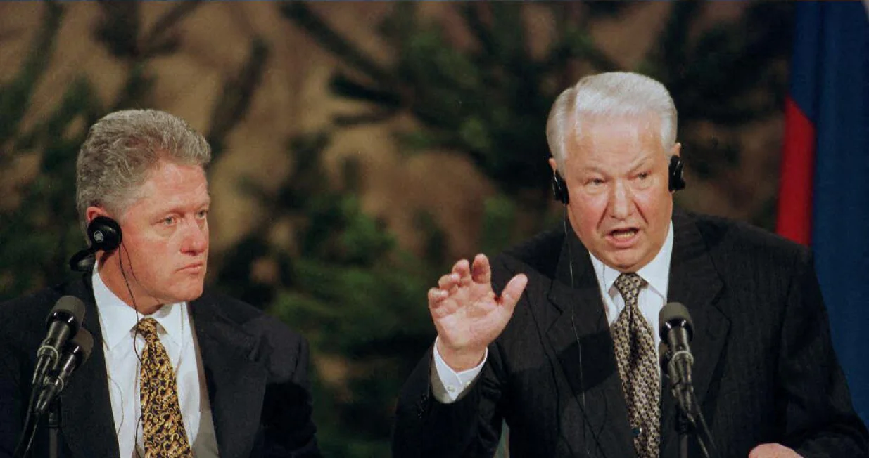 Russian President Boris Yeltsin (R) answers a question as his US counterpart Bill Clinton listens 21 March Helsinki/