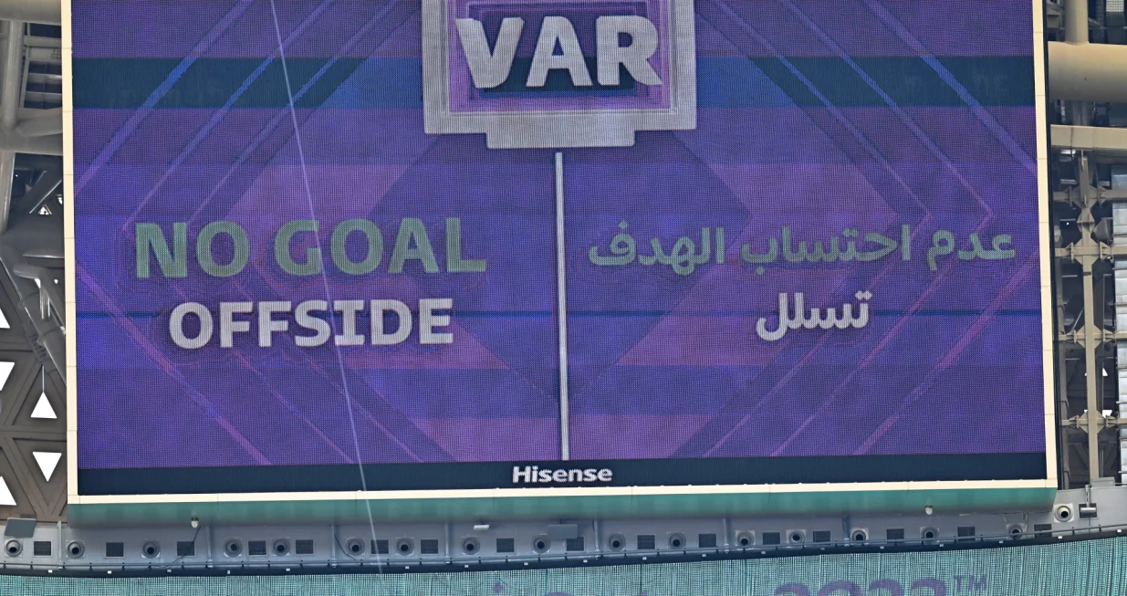 epa10319870 An offside decision by the video assistant referee (VAR) system is announced on a huge screen during the FIFA World Cup 2022 group C soccer match between Argentina and Saudi Arabia at Lusail Stadium in Lusail, Qatar, 22 November 2022. EPA/Noushad Thekkayil