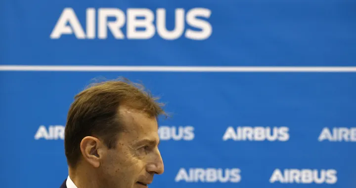 epa09693665 Chief Executive Officer Airbus, Guillaume Faury reacts as he speaks to the media at the ZAL Center for Applied Aviation Research near the Airbus factory in Hamburg, Germany, 18 January 2022. Habeck, co-leader of the German Greens party, is seeking to accelerate Germany's push towards its climate protection goals without decreasing the competitiveness of Germany's manufacturing sector. EPA/Morris MacMatzen/POOL/Morris Macmatzen/Pool