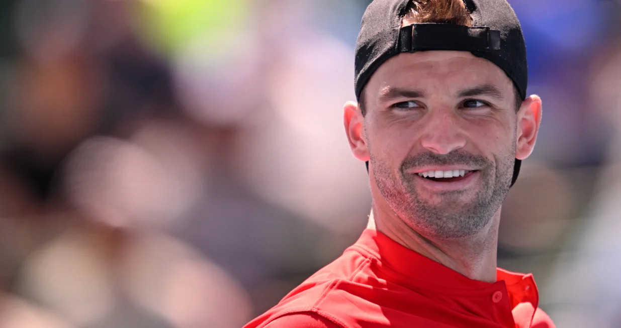 epa10397541 Grigor Dimitrov of Bulgaria reacts while in action against Borna Coric of Croatia during their match in the Care A2+ Kooyong Classic tennis tournament at the Kooyong Lawn Tennis Club in Melbourne, Australia, 10 January 2023. EPA/JAMES ROSS EDITORIAL USE ONLY AUSTRALIA AND NEW ZEALAND OUT