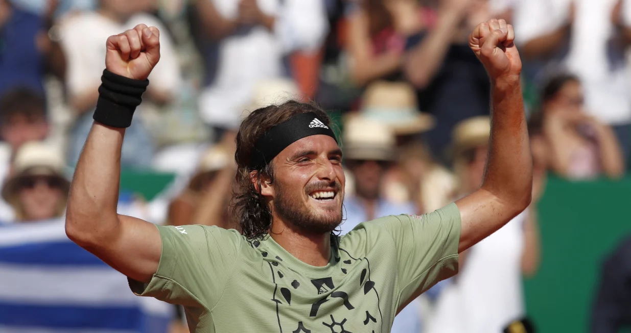 epa09894629 Stefanos Tsitsipas of Greece reacts after winning against Alejandro Davidovich Fokina of Spain at the end of the final of the Monte-Carlo Rolex Masters tournament in Roquebrune Cap Martin, France, 17 April 2022. EPA/SEBASTIEN NOGIER