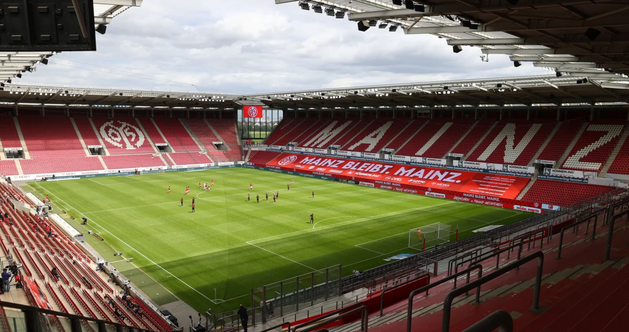 epa08441352 General view inside the stadium before the German Bundesliga soccer match 1. FSV Mainz 05 vs RB Leipzig in Mainz, Germany, 24 May 2020, as play resumes behind closed doors following the outbreak of the coronavirus disease (COVID-19). EPA/KAI PFAFFENBACH/POOL DFL regulations prohibit any use of photographs as image sequences and/or quasi-video.