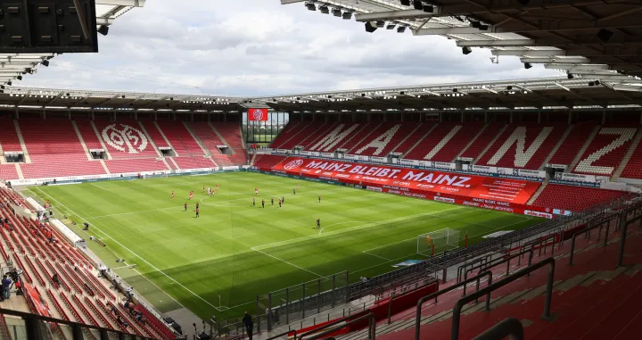 epa08441352 General view inside the stadium before the German Bundesliga soccer match 1. FSV Mainz 05 vs RB Leipzig in Mainz, Germany, 24 May 2020, as play resumes behind closed doors following the outbreak of the coronavirus disease (COVID-19). EPA/KAI PFAFFENBACH/POOL DFL regulations prohibit any use of photographs as image sequences and/or quasi-video.