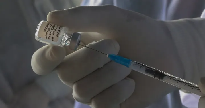 epa09328161 A health worker holds a vial of the Pfizer- BioNTech Comirnaty Covid-19 vaccine at a vaccine center in Colombo, Sri Lanka, 07 July 2021. Following approval by the World Health Organisation for Pfizer- BioNTech and Moderna vaccines to be administered as the second dose for those who have received Astra-Zeneca as the first dose, Sri Lanka is the third South Asian country to receive and begin the vaccination process. The Maldives and Bangladesh are the first and second countries respectively to receive this vaccine through the WHO's COVAX facility, according to the UNICEF. Sri Lanka is currently using Oxford AstraZeneca, China's Sinopharm, Russian Sputnik V, Covid -19 vaccines for the Vaccine rollout. Meanwhile, Sri Lanka is currently experiencing a serious shortage of Oxford AstraZeneca (Covishield) vaccine, to be given as a second dose. EPA/CHAMILA KARUNARATHNE/Chamila Karunarathne