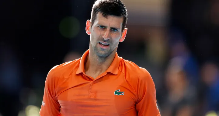 epa10395118 Novak Djokovic of Serbia looks on during his match against Sebastian Korda of the United States in the Men's Singles Final 2023 Adelaide International Tennis Tournament at the Memorial Drive Tennis Centre in Adelaide, Australia, 08 January 2023. EPA/MATT TURNER AUSTRALIA AND NEW ZEALAND OUT