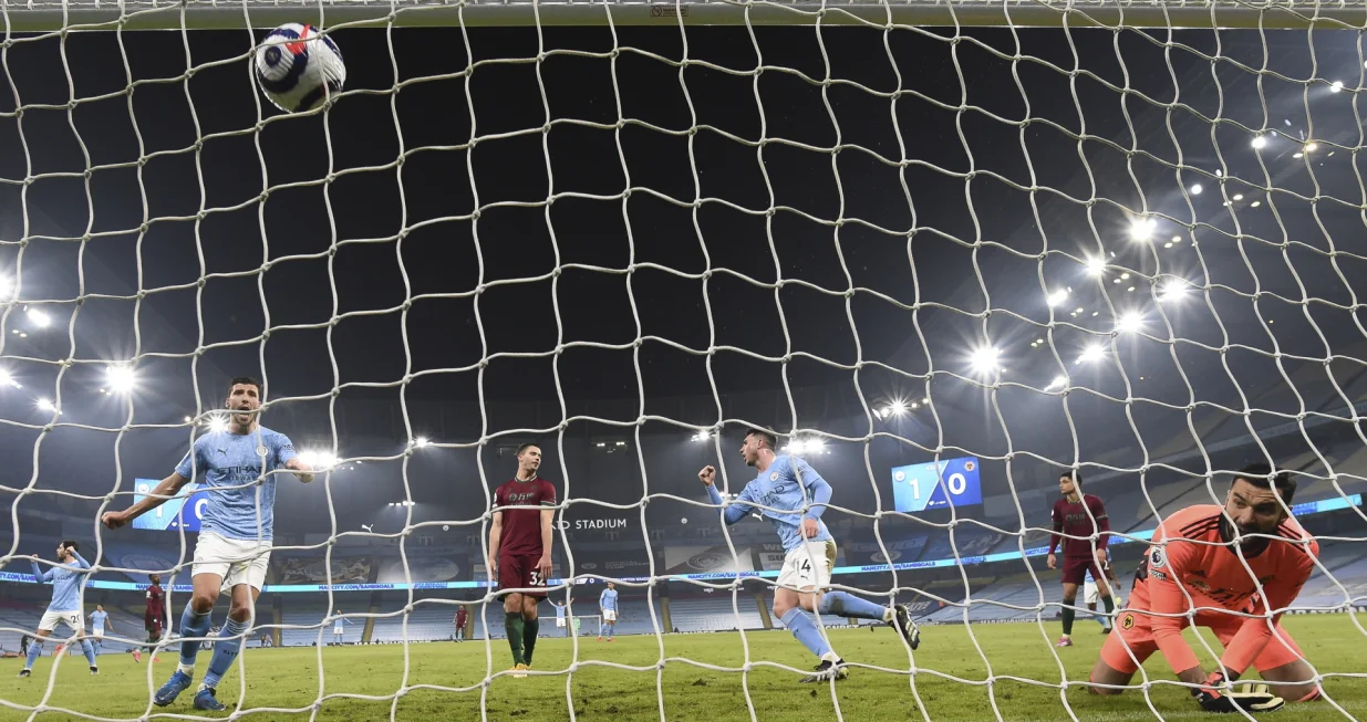 epa09047243 Manchester City's Aymeric Laporte (3-R) scores a goal that was later disallowed during the English Premier League soccer match between Manchester City and Wolverhampton Wanderers in Manchester, Britain, 02 March 2021. EPA/Paul Ellis/POOL EDITORIAL USE ONLY. No use with unauthorized audio, video, data, fixture lists, club/league logos or 'live' services. Online in-match use limited to 120 images, no video emulation. No use in betting, games or single club/league/player publications.