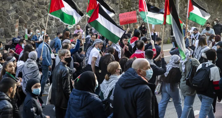 epa09213678 People demonstrate in support of Palestine in Oslo, Norway, 19 May 2021. Tensio​ns have escalated in the region following days of violent confrontations between Israeli security forces and Palestinians in Jerusalem, leading to the​ heaviest offensive in years. EPA/Berit Roald NORWAY OUT/Berit Roald
