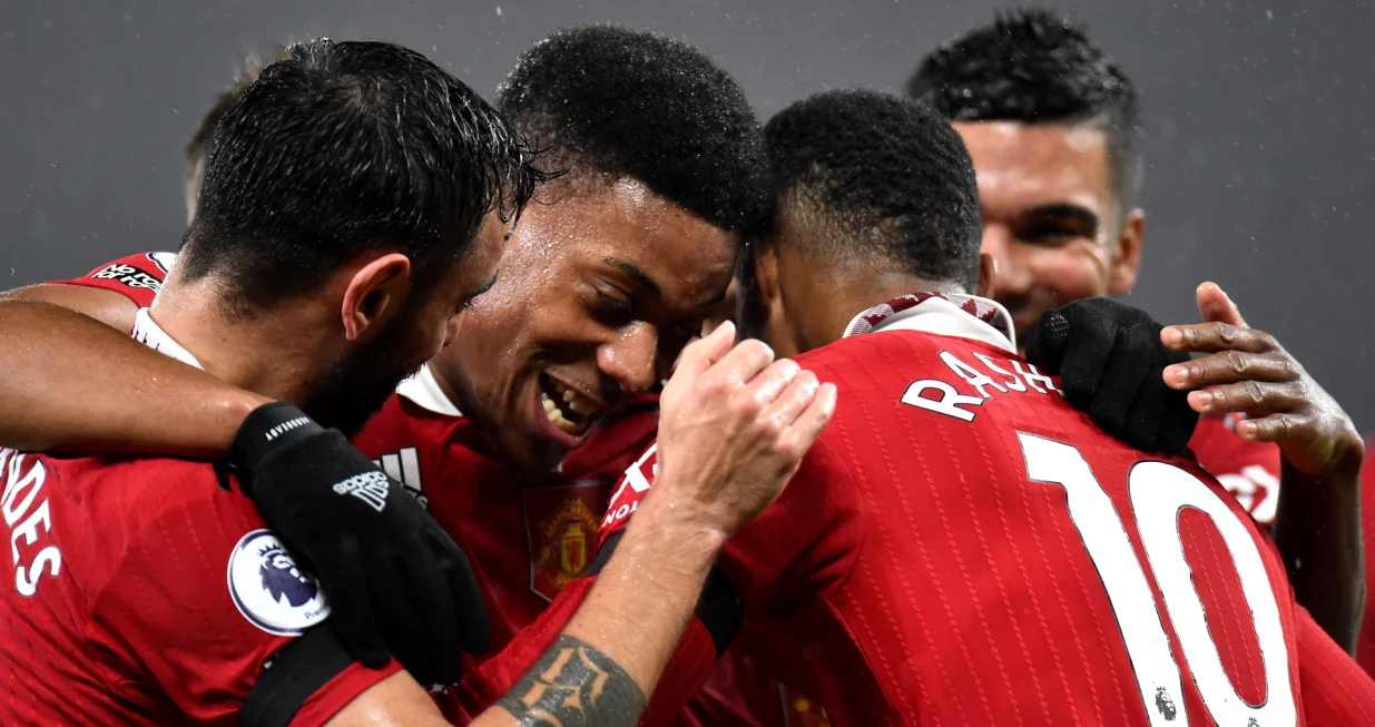 epa10379461 Anthony Martial (C) of Manchester United celebrates with teammates after scoring the 2-0 during the English Premier League soccer match between Manchester United and Nottingham Forest in Manchester, Britain, 27 December 2022. EPA/Peter Powell EDITORIAL USE ONLY. No use with unauthorized audio, video, data, fixture lists, club/league logos or 'live' services. Online in-match use limited to 120 images, no video emulation. No use in betting, games or single club/league/player publications