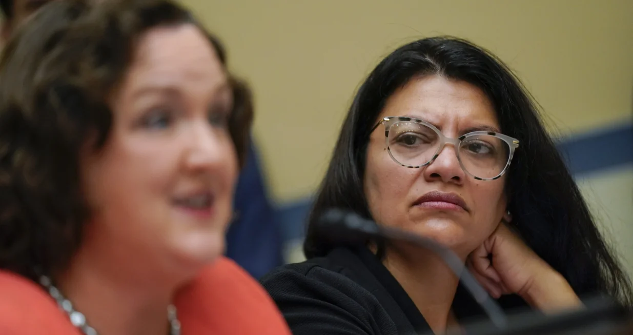 epa10002198 Rep. Rashida Tlaib (R), D-Mich., listens as Rep. Katie Porter (L), D-Calif., speaks during a House Committee on Oversight and Reform hearing on gun violence on Capitol Hill in Washington, DC, USA, 08 June 2022. EPA/Andrew Harnik/POOL/Andrew Harnik/Pool