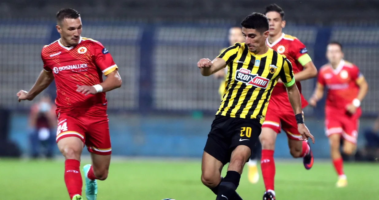 epa09358929 Dino Hasanovic (L) of Velez and Petros Mantalos R) of AEK in action during the UEFA Conference League second qualifying round soccer match  between Velez Mostar and AEK Athens in Sarajevo, Bosnia and Herzegovina, 22 July 2021. EPA/FEHIM DEMIR