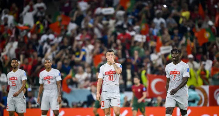 epa10352697 Switzerland's (from L) Djibril Sow, Manuel Akanji, Granit Xhaka and Breel Embolo react after Portugal scored their second goal during the FIFA World Cup 2022 round of 16 soccer match between Portugal and Switzerland at Lusail Stadium in Lusail, Qatar, 06 December 2022. EPA/LAURENT GILLIERON