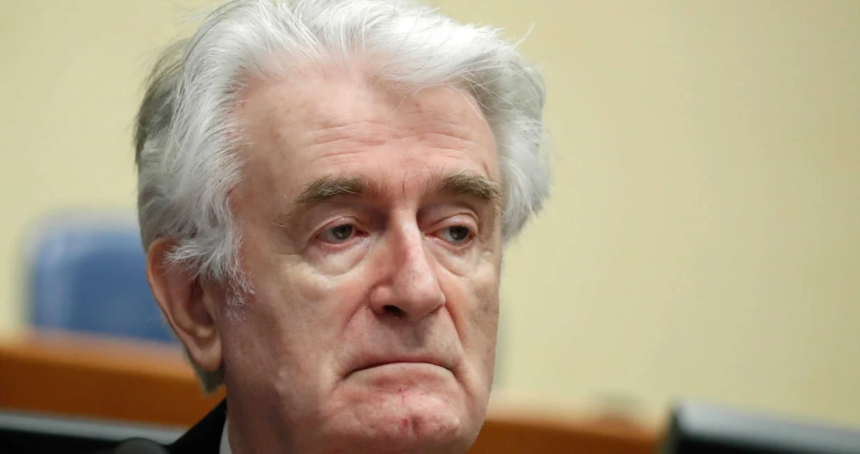 epa08529984 (FILE) - Former Bosnian Serb leader Radovan Karadzic appears in a courtroom before the International Residual Mechanism for Criminal Tribunals (MICT), which handles outstanding war crimes cases for the Balkans and Rwanda, in The Hague, The Netherlands, 24 April 2018 (reissued 06 July 2020). A quarter of a century ago, the world witnessed the worst mass murder on European soil since World War II. Some 7,000-8,000 Bosniaks were slaughtered and 20,000 civilians were forcibly displaced in an act of ethnic cleansing perpetrated in the small eastern Bosnian village of Srebrenica, whose name will forever be linked to the infamous 1995 massacre. Today, 25 years after the massacre, the memory of its victims is kept alive by several institutions, such as the Museum of Crimes Against Humanity and Genocide in Sarajevo or a permanent exhibit at the 'Memorial Center Srebrenica-Potocari' that now occupies the former headquarters of the Dutch UNPROFOR Battalion. EPA/YVES HERMAN/POOL ATTENTION: This Image is part of a PHOTO SET/Yves Herman/Pool
