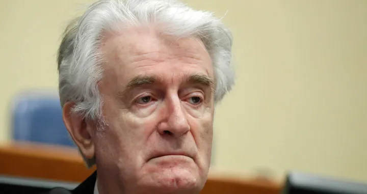 epa08529984 (FILE) - Former Bosnian Serb leader Radovan Karadzic appears in a courtroom before the International Residual Mechanism for Criminal Tribunals (MICT), which handles outstanding war crimes cases for the Balkans and Rwanda, in The Hague, The Netherlands, 24 April 2018 (reissued 06 July 2020). A quarter of a century ago, the world witnessed the worst mass murder on European soil since World War II. Some 7,000-8,000 Bosniaks were slaughtered and 20,000 civilians were forcibly displaced in an act of ethnic cleansing perpetrated in the small eastern Bosnian village of Srebrenica, whose name will forever be linked to the infamous 1995 massacre. Today, 25 years after the massacre, the memory of its victims is kept alive by several institutions, such as the Museum of Crimes Against Humanity and Genocide in Sarajevo or a permanent exhibit at the 'Memorial Center Srebrenica-Potocari' that now occupies the former headquarters of the Dutch UNPROFOR Battalion. EPA/YVES HERMAN/POOL ATTENTION: This Image is part of a PHOTO SET/Yves Herman/Pool