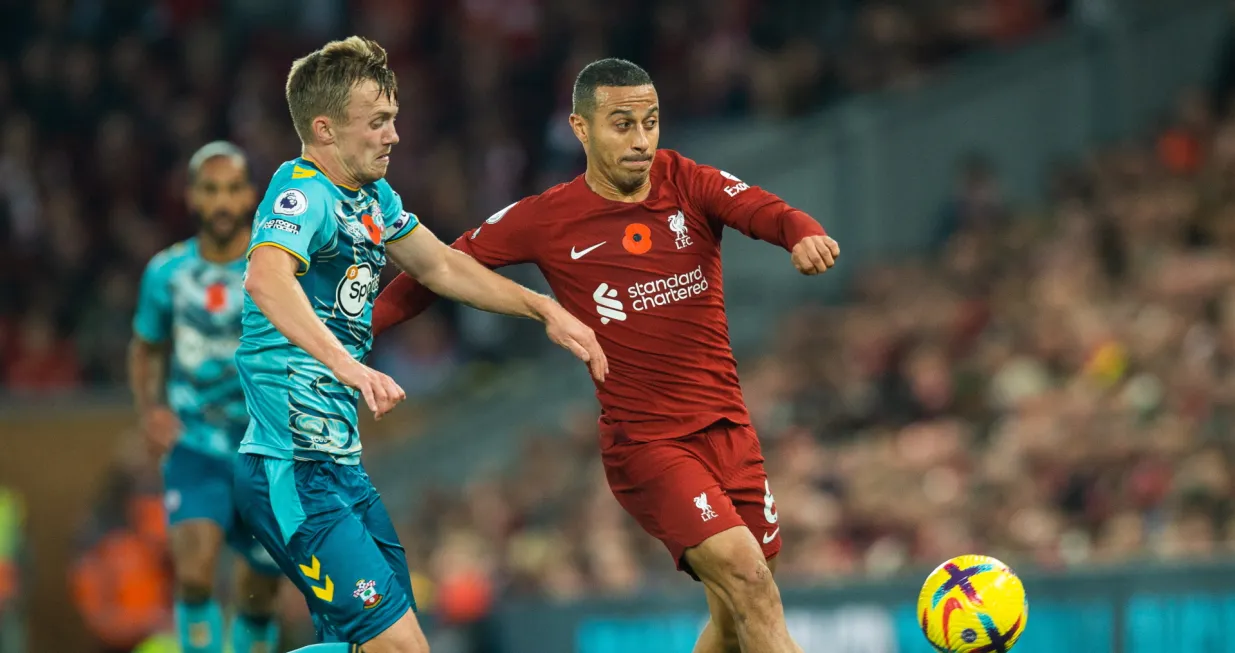 epa10302033 Southampton's Stuart Armstrong (L) in action with Liverpool's Thiago Alcantara (R) during the English Premier League soccer match between Liverpool and Southampton at Anfield in Liverpool, Britain, 12 November 2022. EPA/PETER POWELL EDITORIAL USE ONLY. No use with unauthorized audio, video, data, fixture lists, club/league logos or 'live' services. Online in-match use limited to 120 images, no video emulation. No use in betting, games or single club/league/player publications