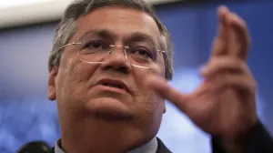 epa10397110 Minister of Justice of Brazil Flavio Dino speaks during a press conference to report on actions to punish those responsible for and involved in the attacks on the headquarters of Congress, the Supreme Court and the Presidency of Brazil, in Brasilia, Brazil, 09 January 2023. At least 300 supporters of former Brazilian President Jair Bolsonaro were arrested on 08 january for invading and destroying the headquarters of Congress, the Presidency and the Supreme Court, in an attempted try to overthrow President Luiz Inacio Lula da Silva, official sources reported. EPA/ANDRE COELHO/Andre Coelho