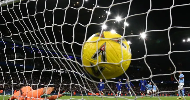 epa10396180 Manchester City's Riyad Mahrez scores the 4-0 past Chelsea's goalkeeper Kepa Arrizabalaga during the FA Cup third round match between Manchester City and Chelsea FC in Manchester, Britain, 08 January 2023. EPA/Adam Vaughan EDITORIAL USE ONLY. No use with unauthorized audio, video, data, fixture lists, club/league logos or 'live' services. Online in-match use limited to 120 images, no video emulation. No use in betting, games or single club/league/player publications