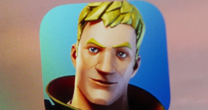 epa08623378 The Fortnite icon seen on an Apple iPhone X in Billerica, Massachusetts, USA, 24 August 2020. Epic Games Inc., the maker of the popular game Fortnite, is in a legal battle with Apple Inc., NASDAQ: APPL, following the removal of the game from the iOS App Store over a dispute on the distribution of income from in-app purchases of the game Fortnite. EPA/CJ GUNTHER/Cj Gunther