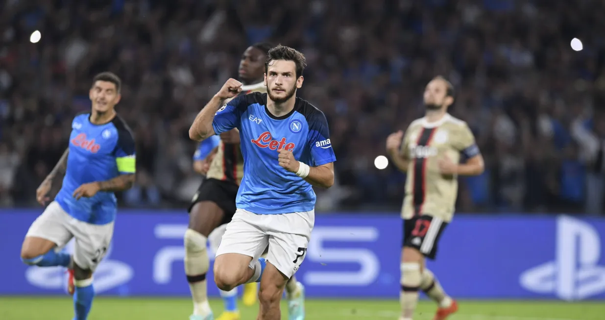 epa10239297 Napoli's midfielder Khvicha Kvaratskhelia jubilates after scoring during the Champions League group A soccer match between Napoli and Ajax, in Naples, Italy, 12 October 2022. EPA/CIRO FUSCO