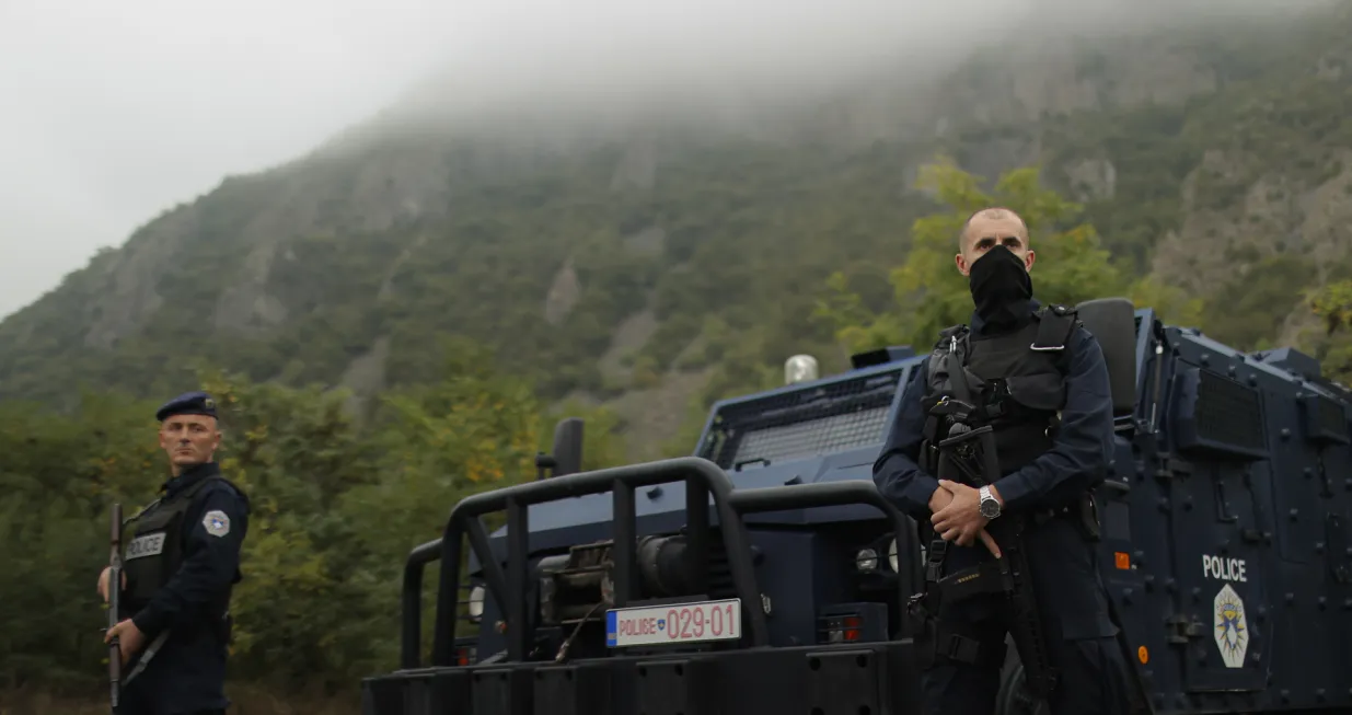 epaselect epa09492602 Kosovo Police Special Operations Unit patrol the area near the border crossing between Kosovo and Serbia in Jarinje, Kosovo, 28 September 2021. Kosovo Serbs in the northern part of the ethnically divided town of Mitrovica set up road barricades with trucks and cars to protest against the Kosovo government's entry ban on vehicles with Serbian registration plates. EPA/VALDRIN XHEMAJ/Valdrin Xhemaj