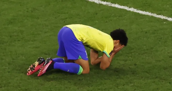 epa10357503 Marquinhos of Brazil reacts after his penalty shot hit the post, which led to the elimination of Brazil during the FIFA World Cup 2022 quarter final soccer match between Croatia and Brazil at Education City Stadium in Doha, Qatar, 09 December 2022. EPA/Rolex dela Pena