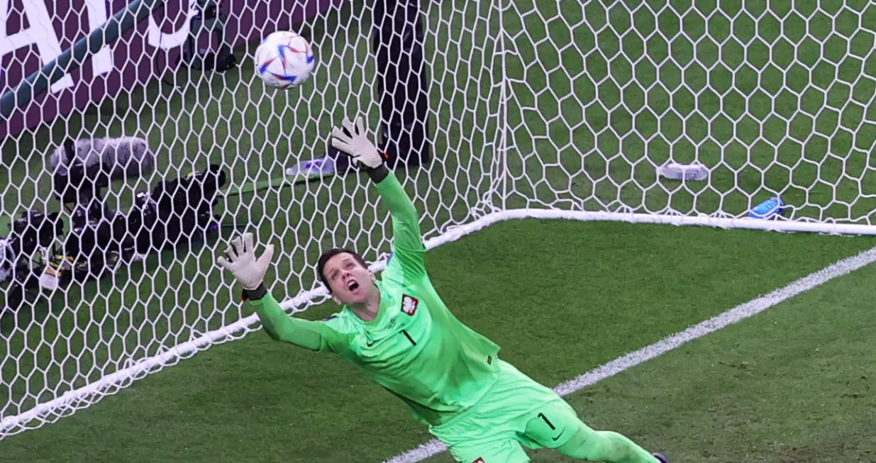 epa10348266 Goalkeeper Wojciech Szczesny of Poland fails to save the 2-0 goal by Kylian Mbappe of France during the FIFA World Cup 2022 round of 16 soccer match between France and Poland at Al Thumama Stadium in Doha, Qatar, 04 December 2022. EPA/Abedin Taherkenareh