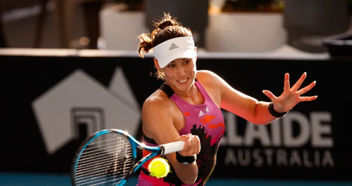 epa10396672 Garbine Muguruza of Spain in her match against Belinda Bencic of Switzerland during the 2023 Adelaide International Tennis Tournament at the Memorial Drive Tennis Centre in Adelaide, Australia, 09 January 2023. EPA/MATT TURNER AUSTRALIA AND NEW ZEALAND OUT