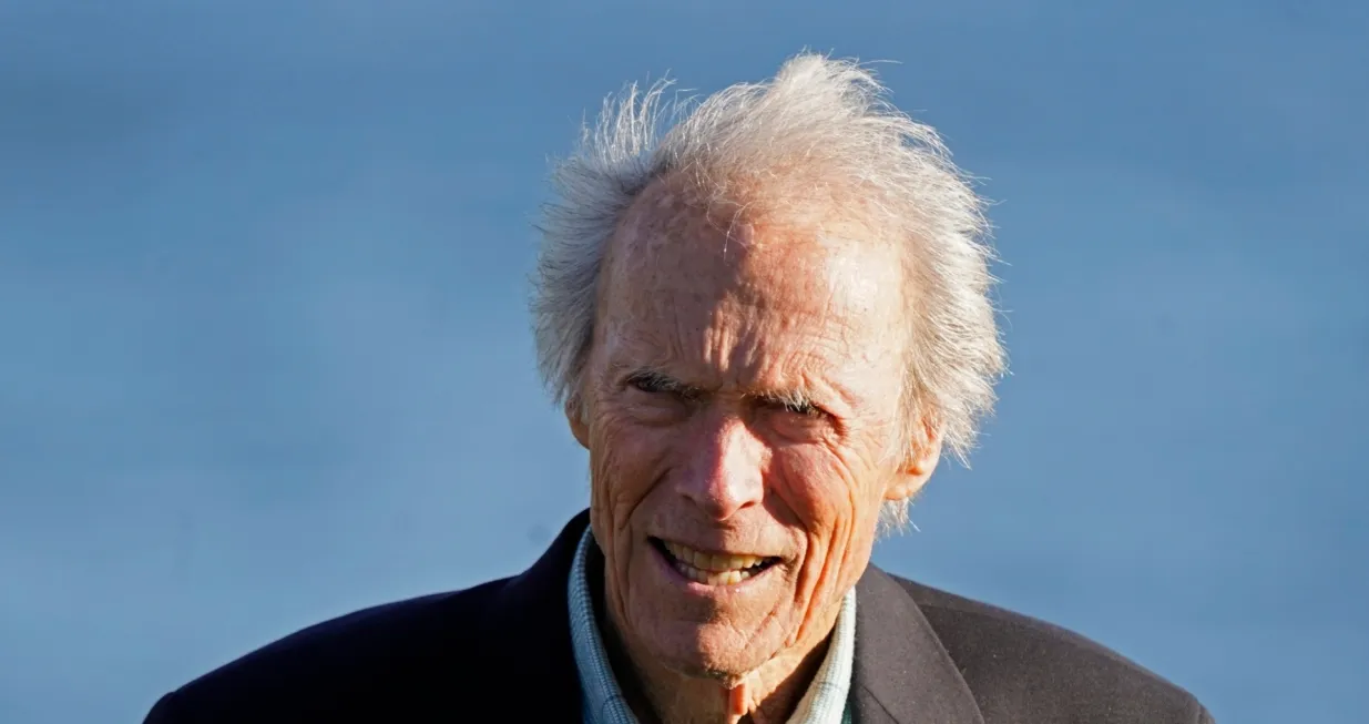 Clint Eastwood stands on the 18th green of the Pebble Beach Golf Links during the awards presentation of the AT&T Pebble Beach Pro-Am golf tournament in Pebble Beach, Calif., Sunday, Feb. 6, 2022. (AP Photo/Eric Risberg)/Eric Risberg