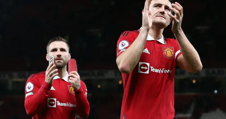 epa10387885 Luke Shaw (L) and Harry Maguire (R) of Manchester United react following the English Premier League soccer match between Manchester United and AFC Bournemouth, in Manchester, Britain, 03 January 2023. EPA/ADAM VAUGHAN EDITORIAL USE ONLY. No use with unauthorized audio, video, data, fixture lists, club/league logos or 'live' services. Online in-match use limited to 120 images, no video emulation. No use in betting, games or single club/league/player publications.