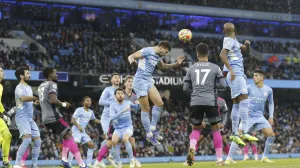 epa09657290 Manchester City's Aymeric Laporte (C) in action during the English Premier League match between Manchester City and Leicester City in Manchester, Britain, 26 December 2021. EPA/MAGI HAROUN EDITORIAL USE ONLY. No use with unauthorized audio, video, data, fixture lists, club/league logos or 'live' services. Online in-match use limited to 120 images, no video emulation. No use in betting, games or single club/league/player publications