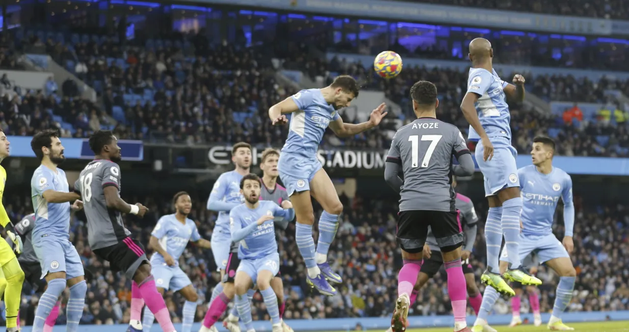 epa09657290 Manchester City's Aymeric Laporte (C) in action during the English Premier League match between Manchester City and Leicester City in Manchester, Britain, 26 December 2021. EPA/MAGI HAROUN EDITORIAL USE ONLY. No use with unauthorized audio, video, data, fixture lists, club/league logos or 'live' services. Online in-match use limited to 120 images, no video emulation. No use in betting, games or single club/league/player publications