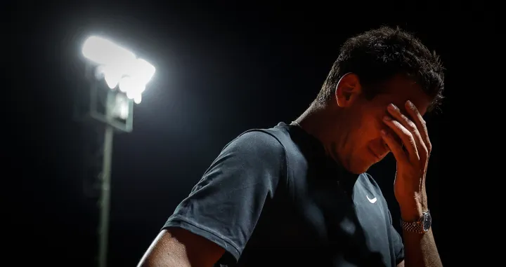 epaselect epa09739817 Argentinian Juan Martin del Potro reacts after losing against Argentinian Federico Delbonis during the Argentina Open tennis match at the Buenos Aires Lawn Tennis Club in Buenos Aires, Argentina, 08 February 2022. EPA/Juan Ignacio Roncoroni