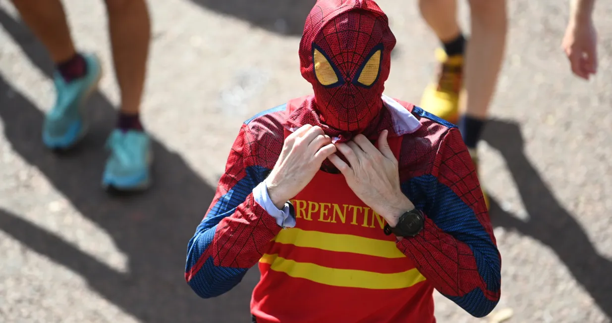 epa10219425 A runner in a Spiderman costume finishes the 2022 TCS London Marathon in London, Britain, 02 October 2022. EPA/NEIL HALL/Neil Hall