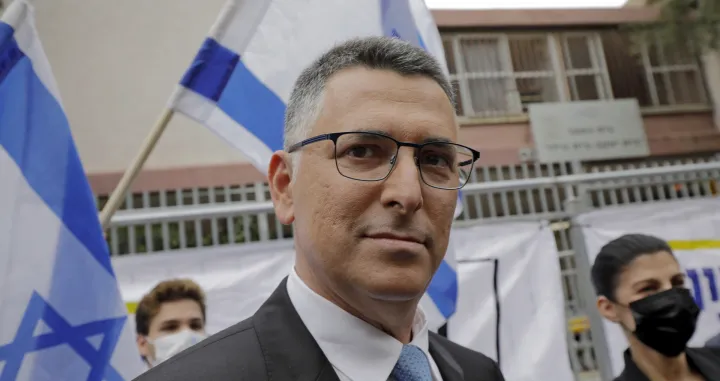 epa09090997 Chairman of Israel's New Hope party Gideon Saar and his wife Geula are pictured outside a polling station in the coastal city of Tel Avivi, on 23 March 2021. Israelis are heading to the polls for a fourth general election, in less than two years, to elect the 120 members of the 24nd Knesset, or parliament. According to the Israel Central Bureau of Statistics, more than six million Israelis are eligible to vote. EPA/JALAA MAREY/POOL/Jalaa Marey/Pool