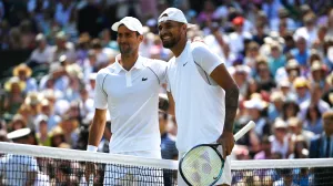 epa10064166 Nick Kyrgios (R) of Australia and Novak Djokovic of Serbia meet at the net before the start of the men's final match at the Wimbledon Championships, in Wimbledon, Britain, 10 July 2022. EPA/NEIL HALL  EDITORIAL USE ONLY