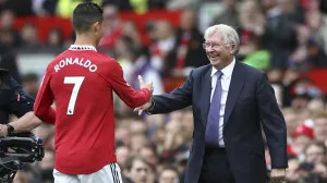 epaselect epa10247085 Former Manchester United manager Sir Alex Ferguson greets Cristiano Ronaldo (L) of Manchester United prior to the English Premier League soccer match between Manchester United and Newcastle United in Manchester, Britain, 16 October 2022. EPA/ADAM VAUGHAN EDITORIAL USE ONLY. No use with unauthorized audio, video, data, fixture lists, club/league logos or 'live' services. Online in-match use limited to 120 images, no video emulation. No use in betting, games or single club/league/player publications